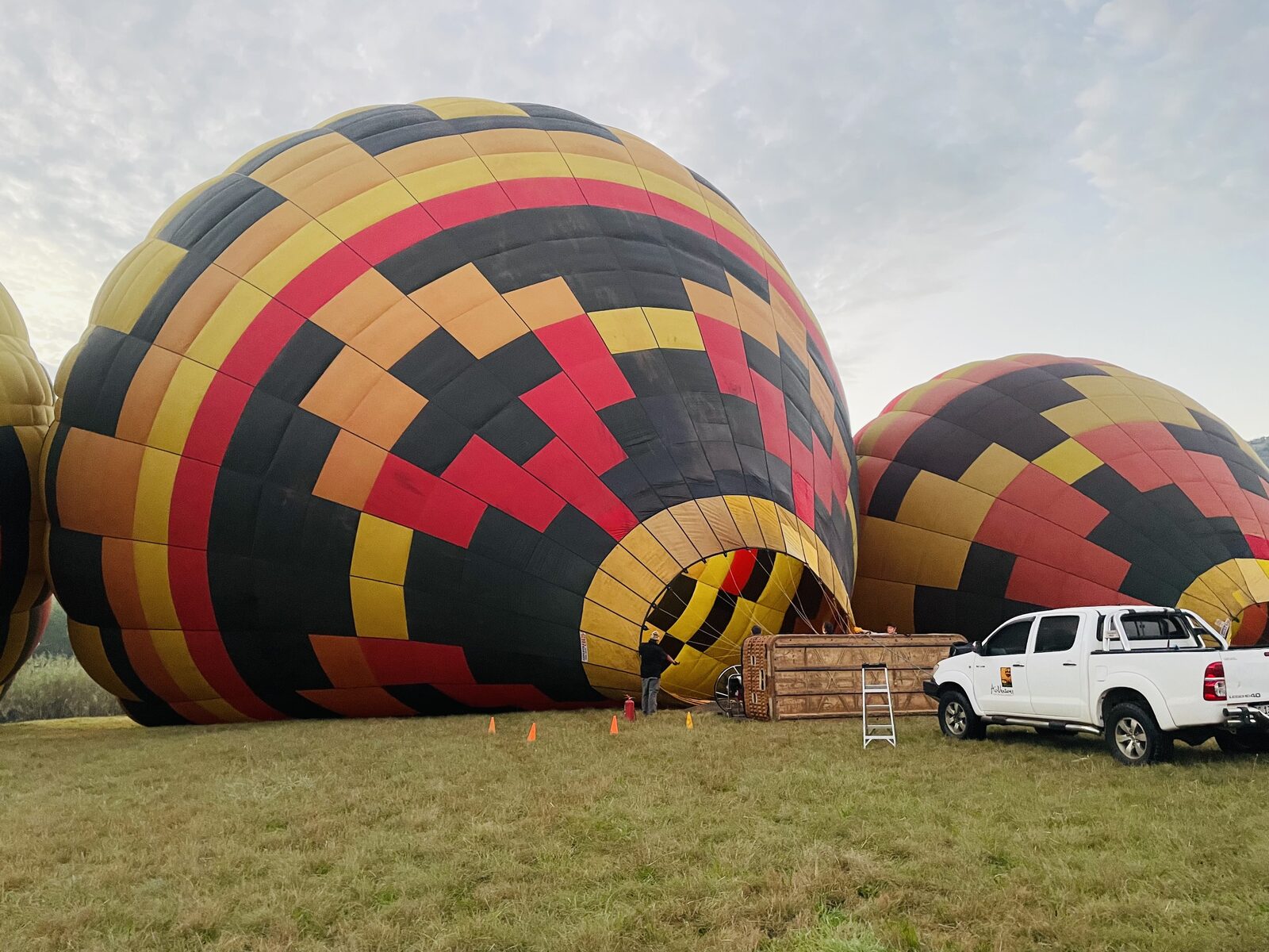 The ground crew inflating the balloons at the launch site