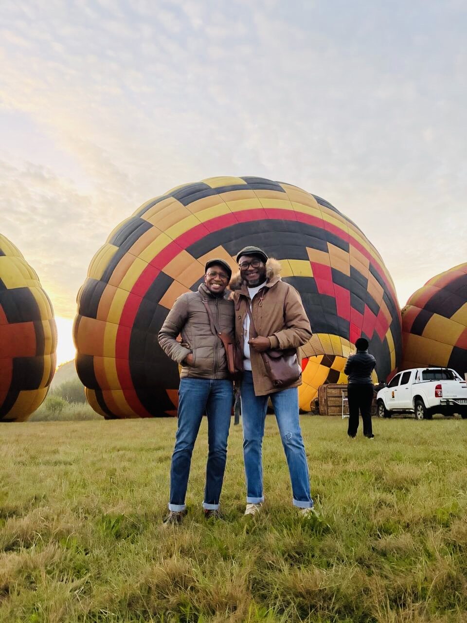 Thabo Makate and partner at the launch field at dawn