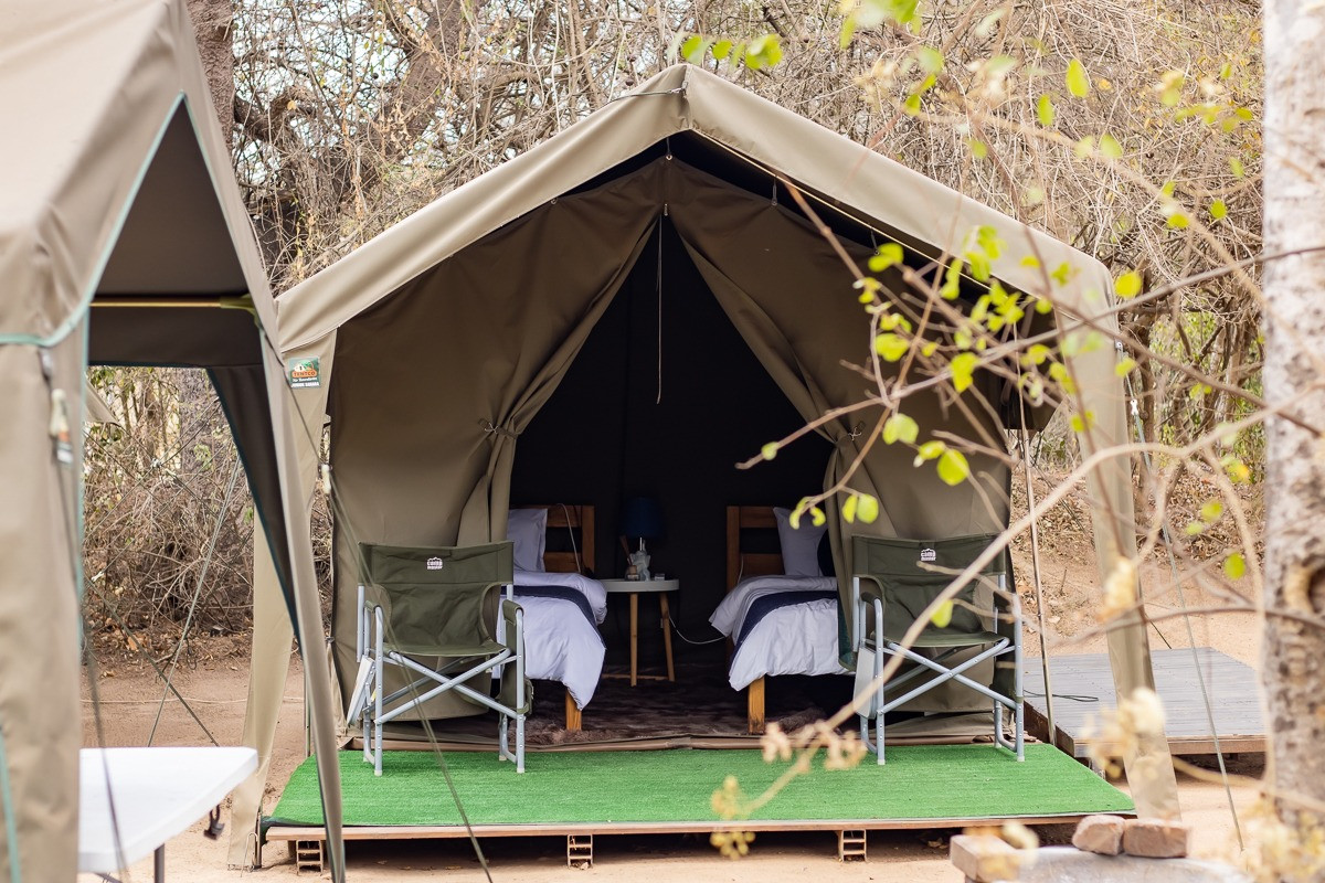 A comfortable safari tent at a Kruger bush camp — budget accommodation does not mean roughing it