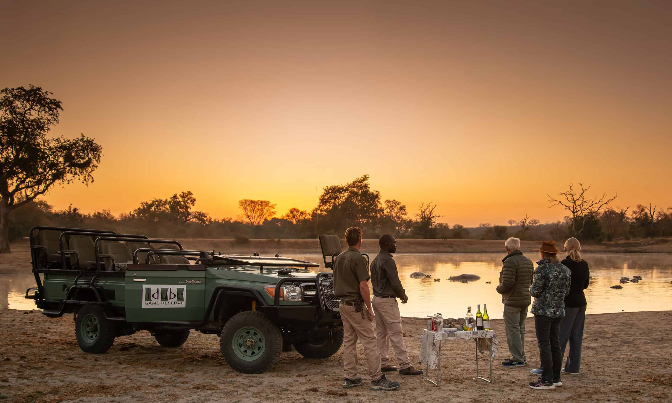Golden-hour sundowners on a small group safari drive